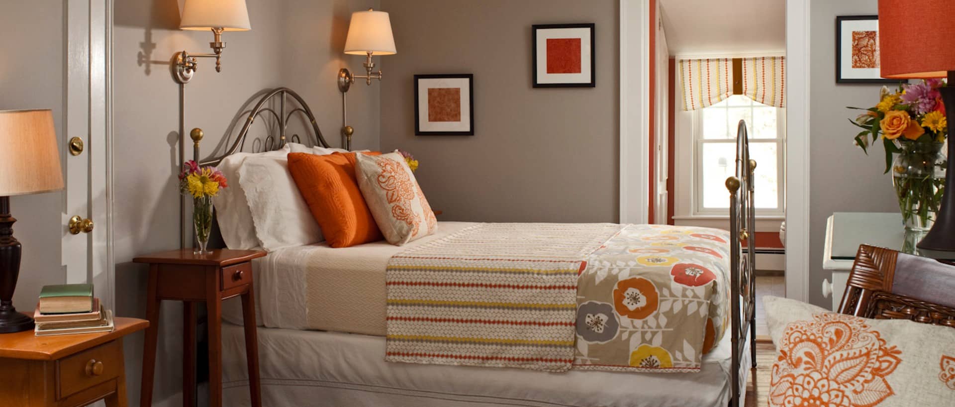 beige striped bedspread with flowers